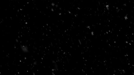 Snow-flakes-overlay,-black-background.-Winter,-slowly-falling-snow-effect-seamless-loop